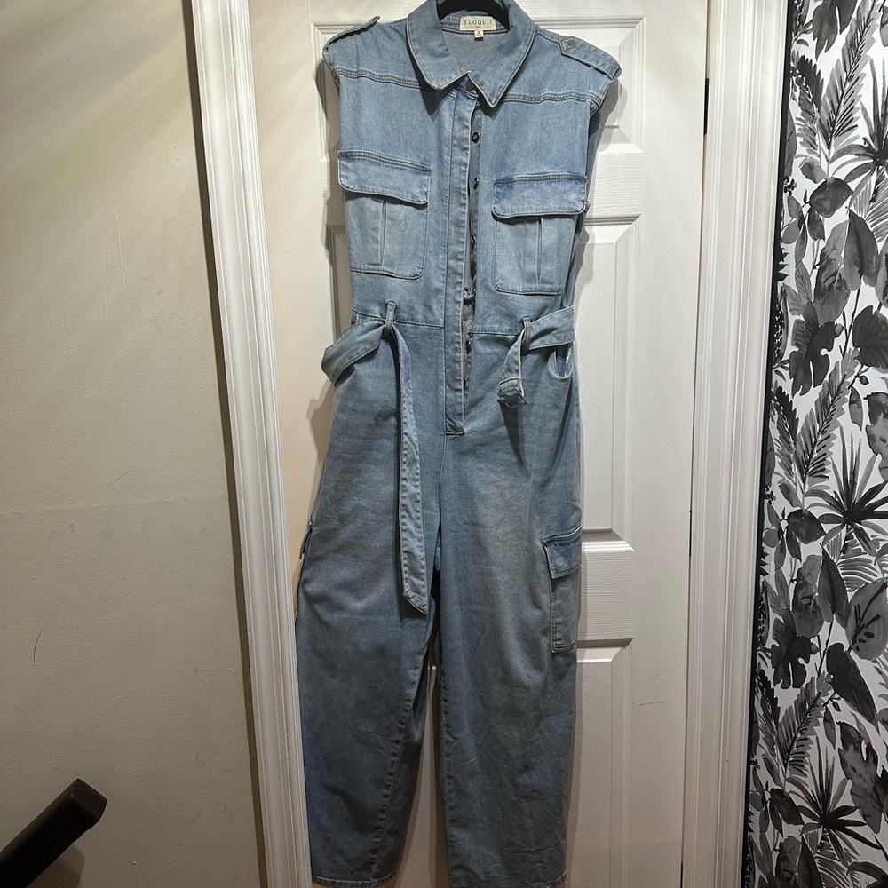 Denim Cargo jumpsuit with shoulder pads.
